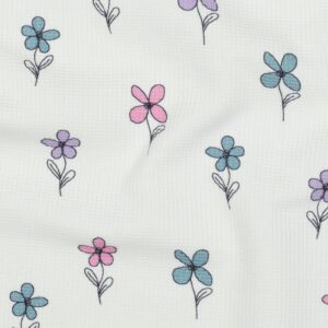 Tissu coton gaufré écru avec petites fleurs pastel roses, lilas et bleues