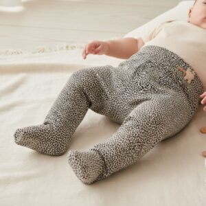 Tissu jersey de coton motif mini léopard noir sur fond kaki sauge