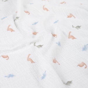 mousseline de coton blanche avec petits dinosaures pastel terracotta bleu et sauge