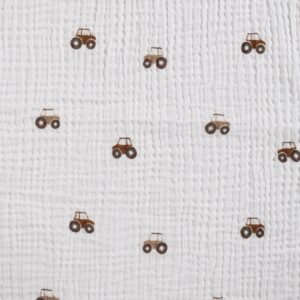 mousseline de coton écrue avec petits tracteurs bruns motif enfant Minifra
