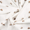mousseline de coton écrue avec petits tracteurs bruns motif enfant Minifra
