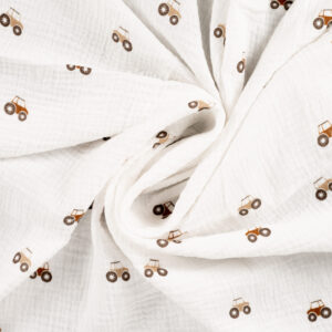 mousseline de coton écrue avec petits tracteurs bruns motif enfant Minifra