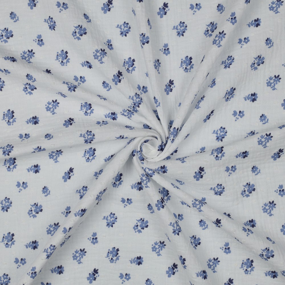 mousseline de coton écrue avec petites fleurs bleu délicat motif floral léger
