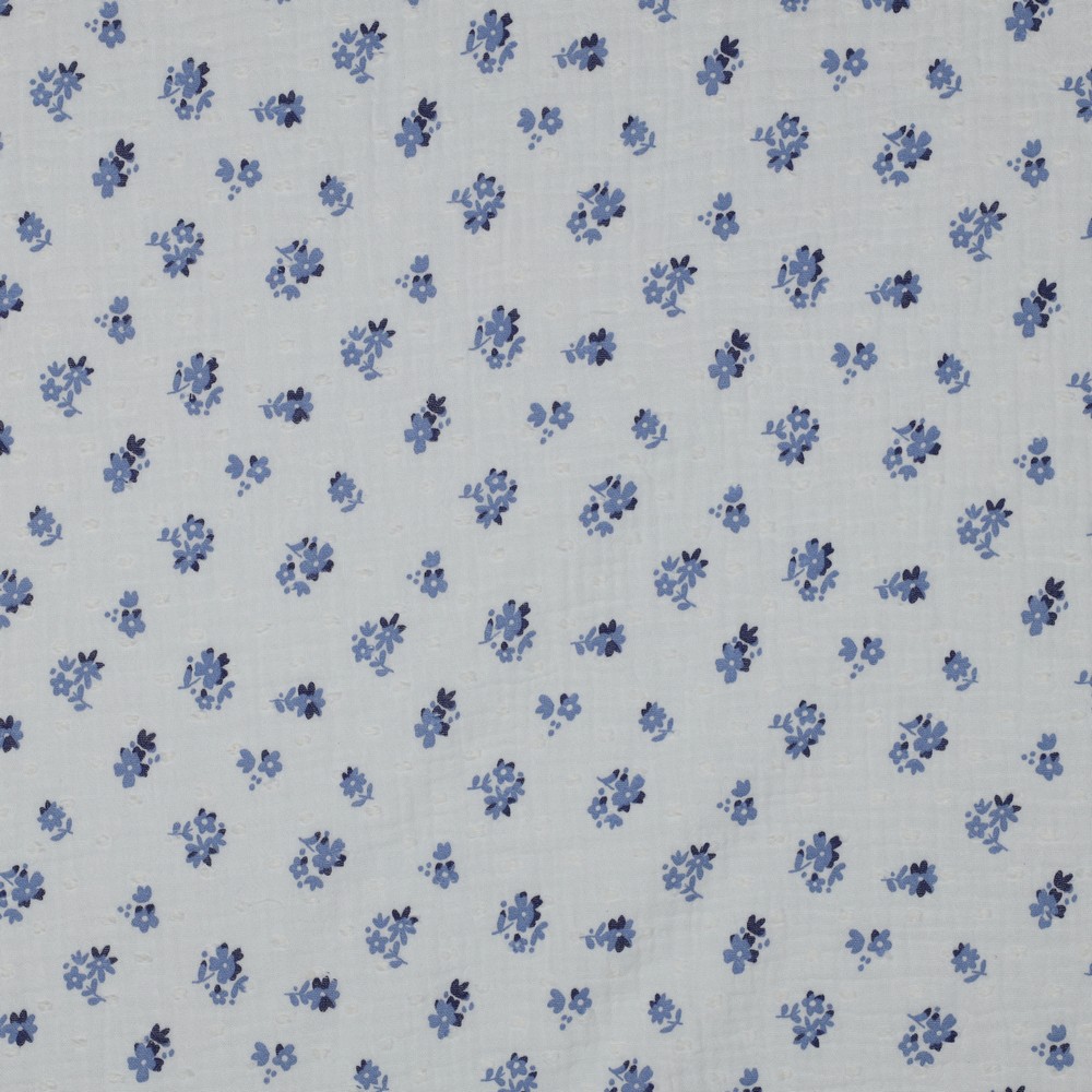 mousseline de coton écrue avec petites fleurs bleu délicat motif floral léger